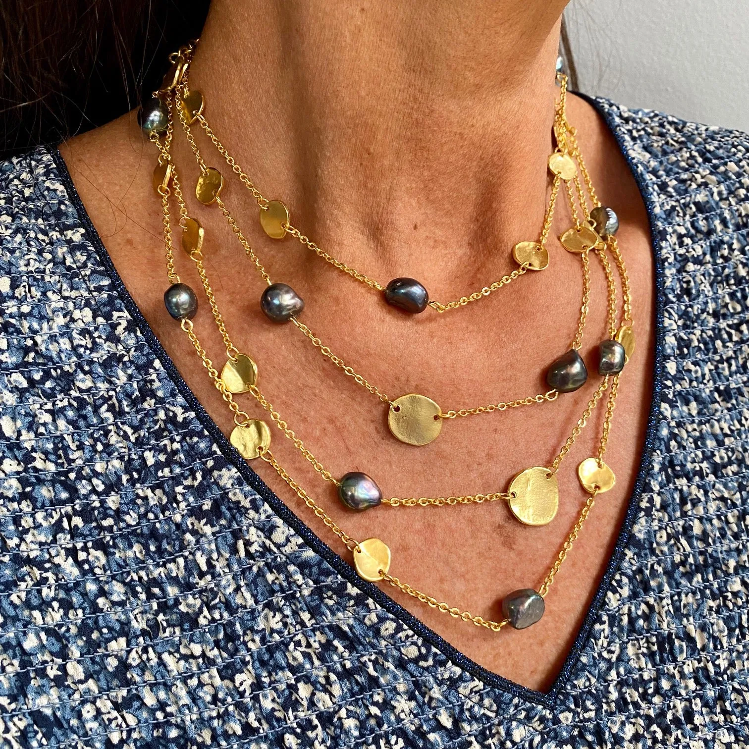 Coin and peacock pearl multi strand necklace